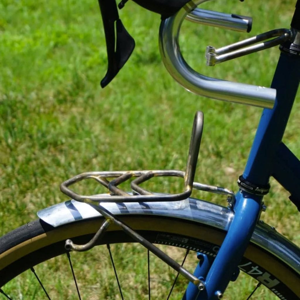Decaleur front rack on an old blue bike
