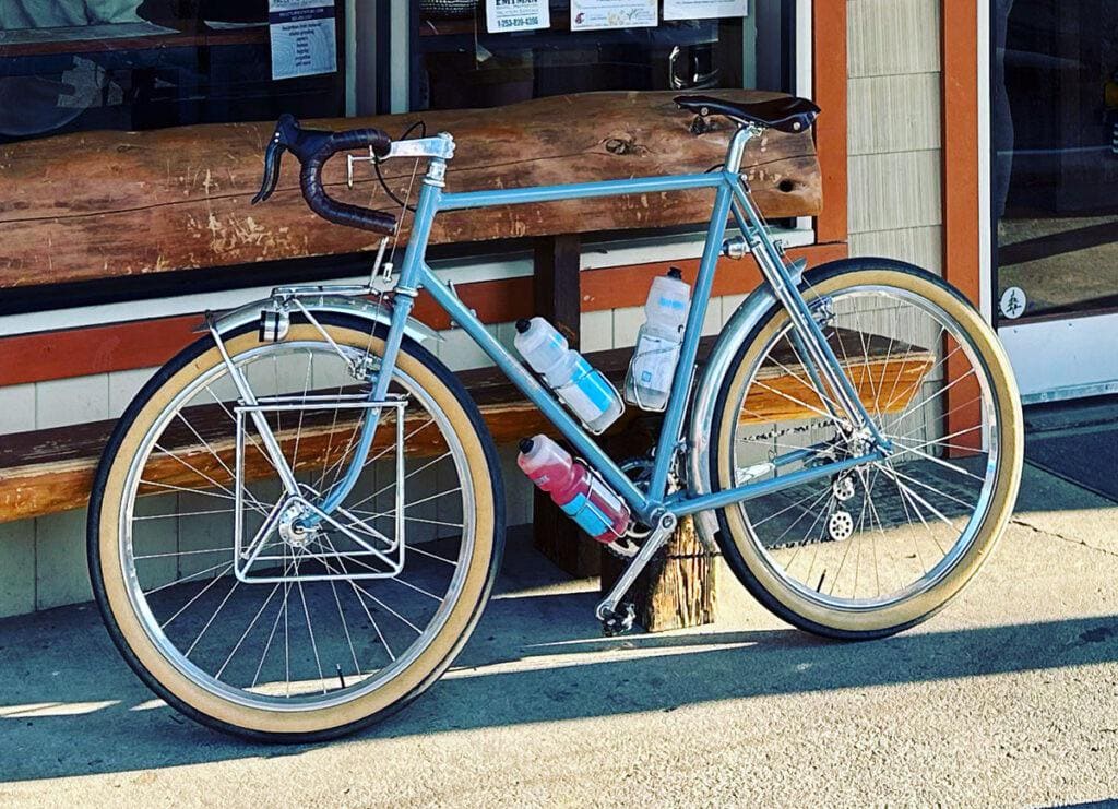 A custom Lowrider Front Rack on a blue bike