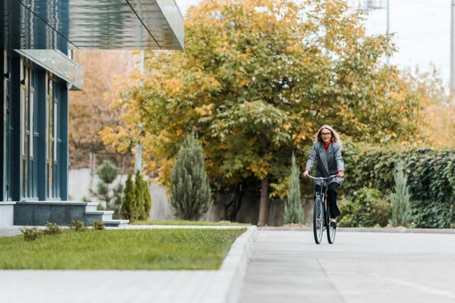 Woman arriving at work on her bicycle