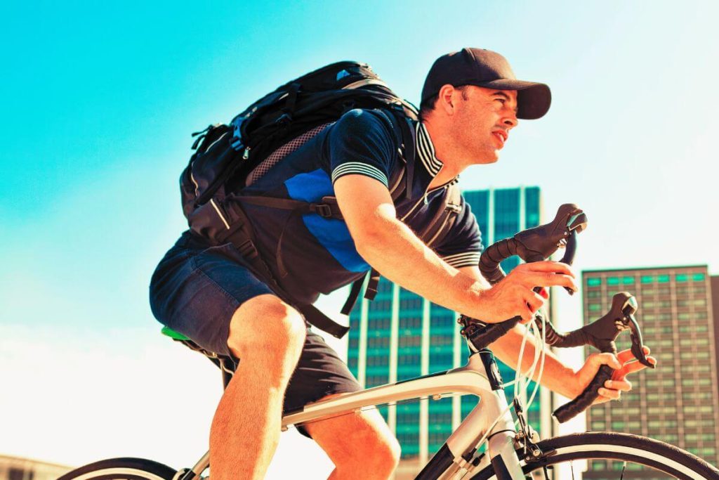 Lean cyclist riding to work