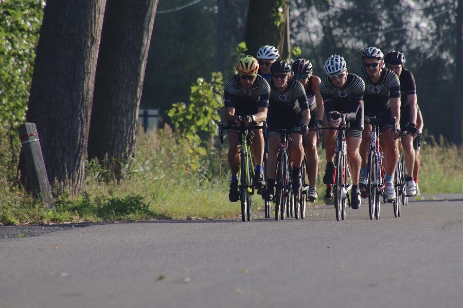 Group of male cyclist enjoying ride on a marathon