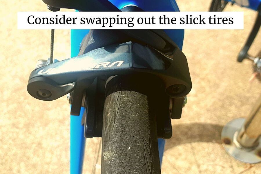 slick tires may not be the way to go in winter months depending on where you live