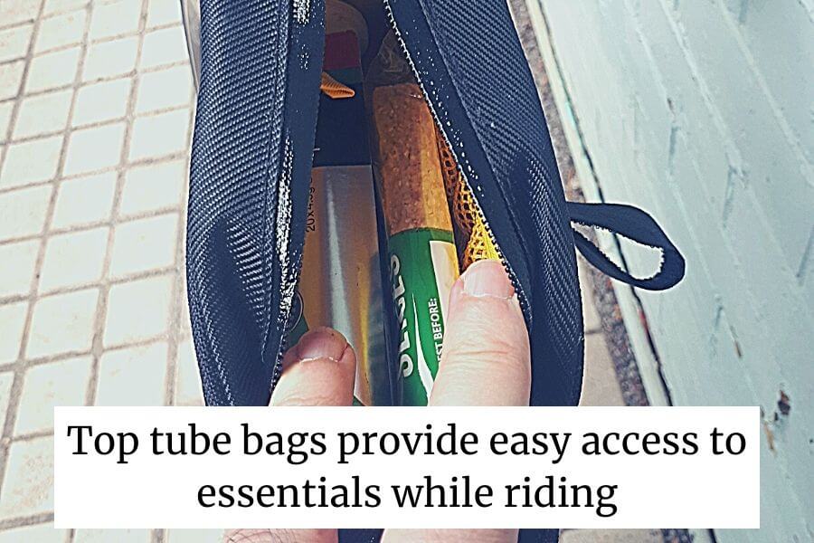 easy access to essential items stored inside a top tube bag
