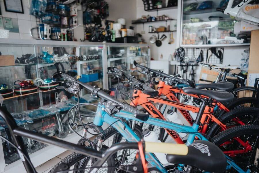 Different bikes and accessories in a bike shop