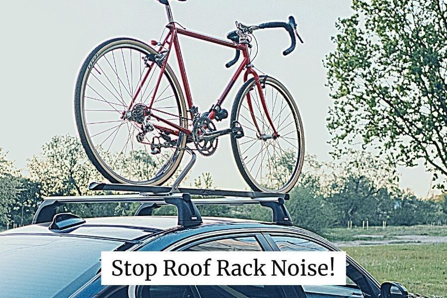 Car with rack and bike on roof