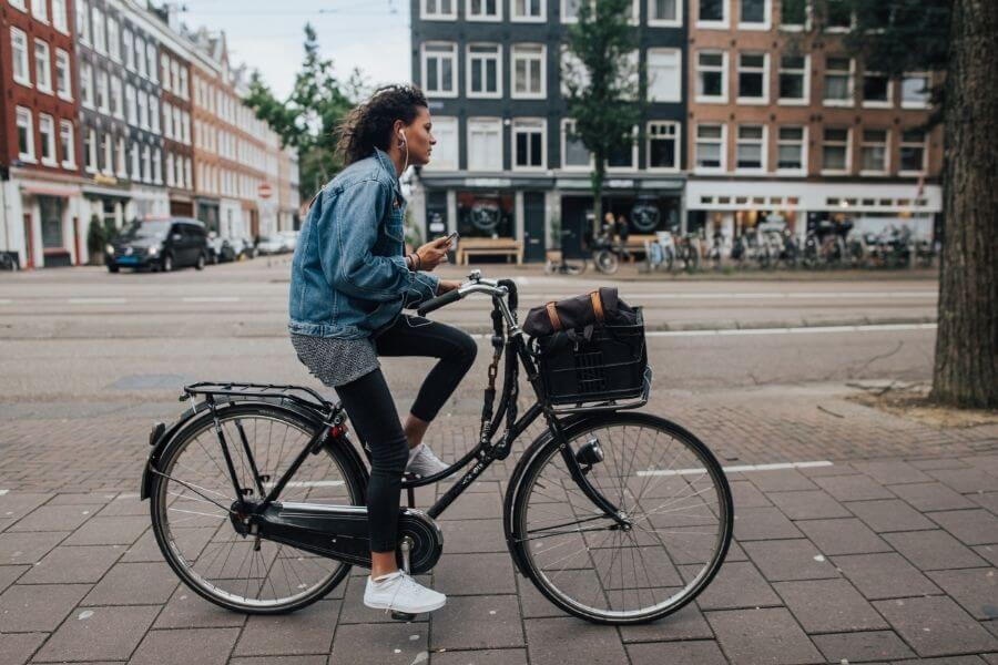Woman Riding A Bike With A Step-Through Frame