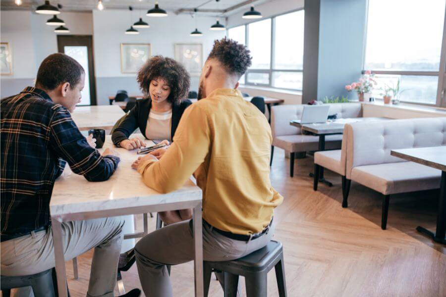 Colleagues having conversation in the office