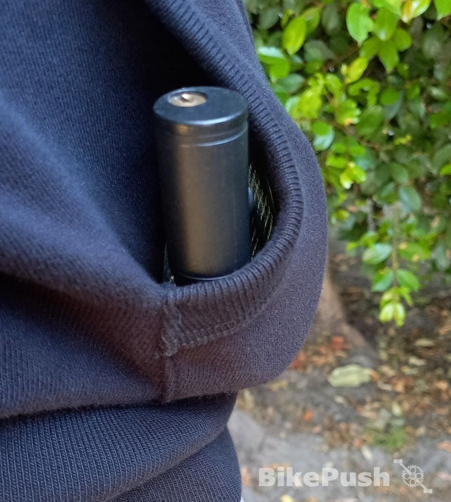Bicycle cable lock inside a hoodie pocket