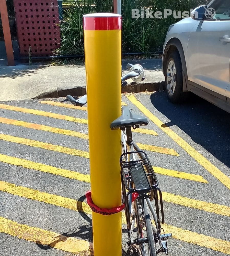 bike locked to bollard but easy to steal