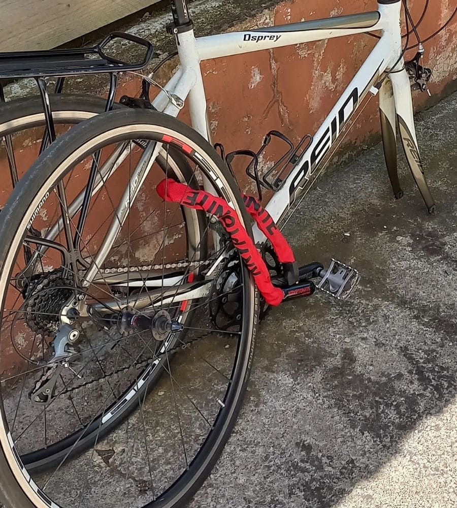 Bicycle locked to itself with the front wheel detached