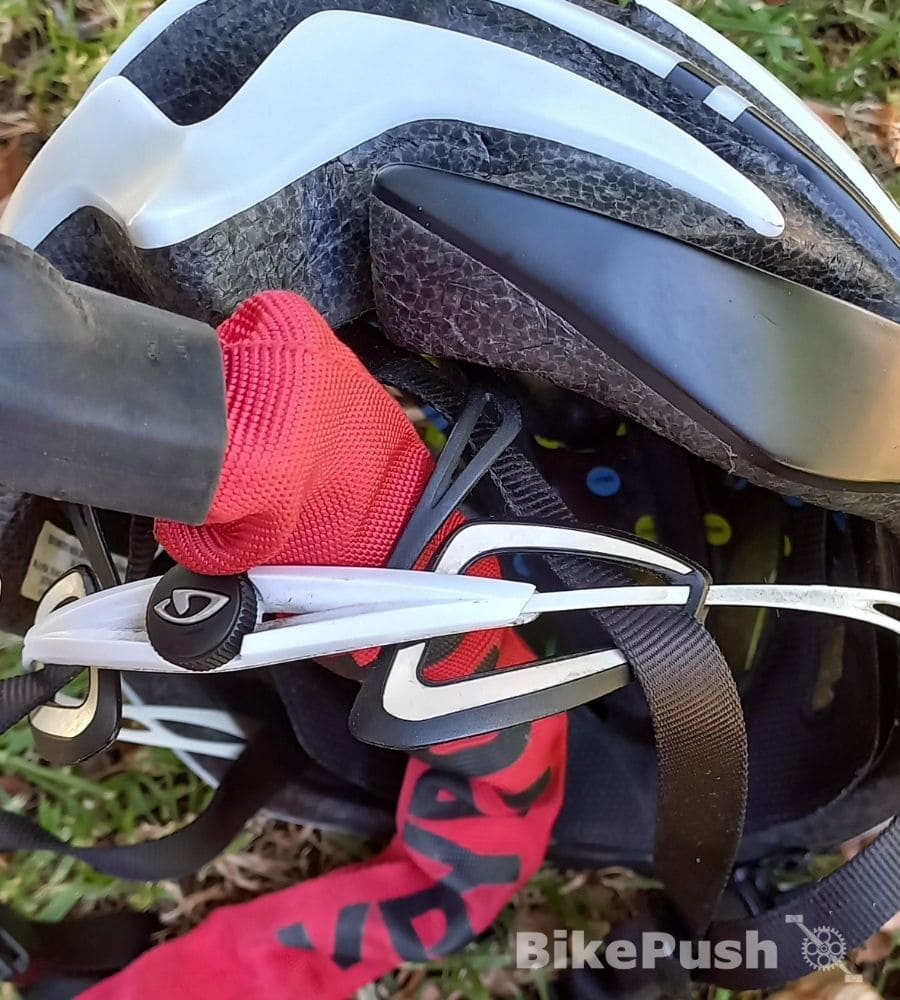 Chain lock locking up a bicycle helmet