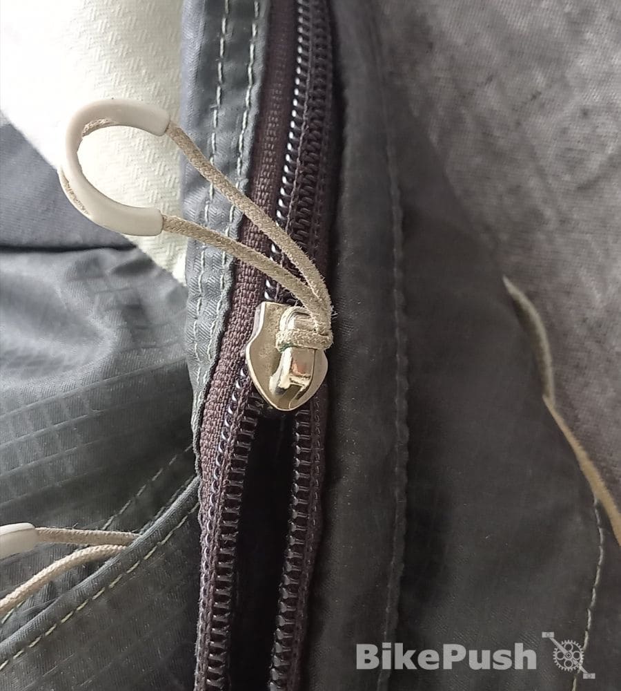 Closeup of backpacker zipper on a cycling backpack