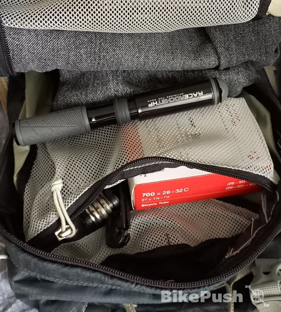 Cycling backpack with spare tools and clothes inside