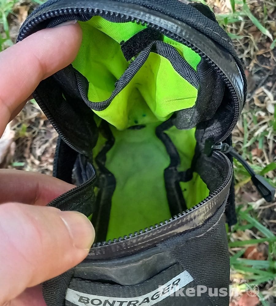 Inside a medium sized bicycle saddle bag