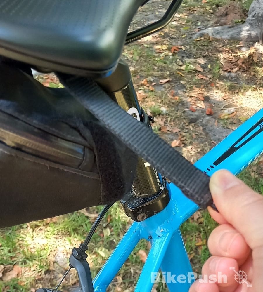 Straps of saddle bag that go around saddle rails