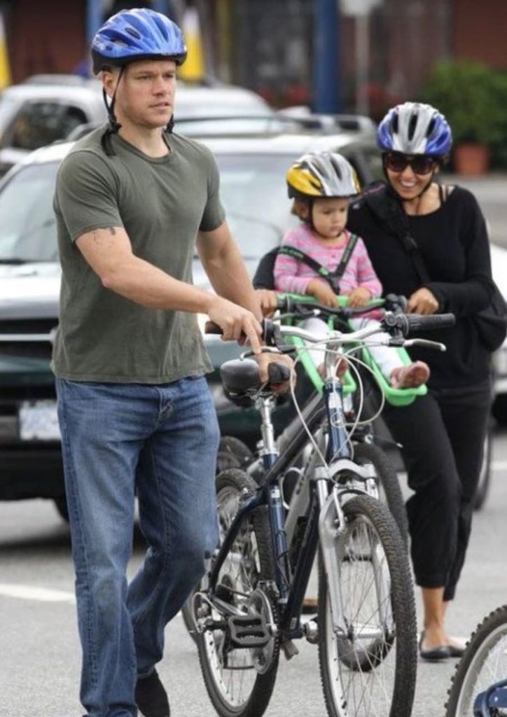 matt damon with family on bicycles