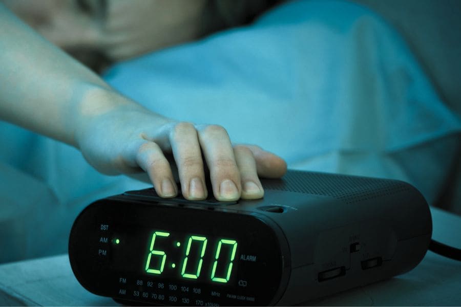 6am alarm clock hit snooze button
