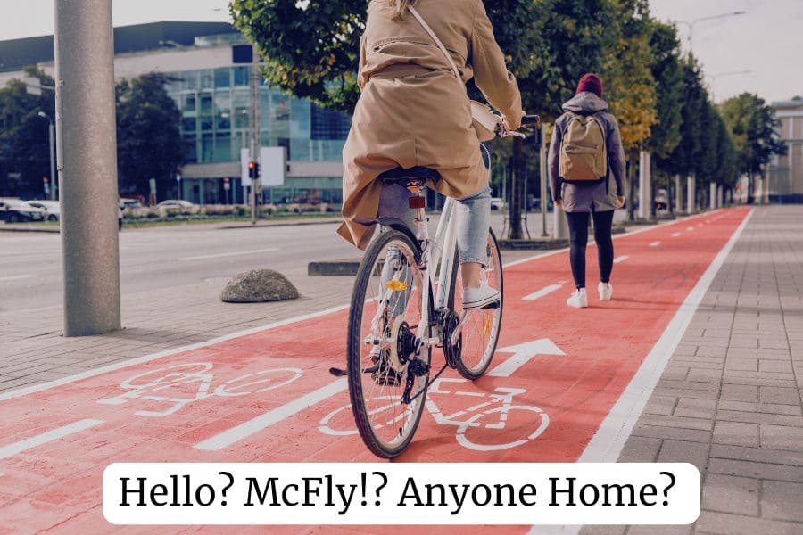 person walking on bike lane