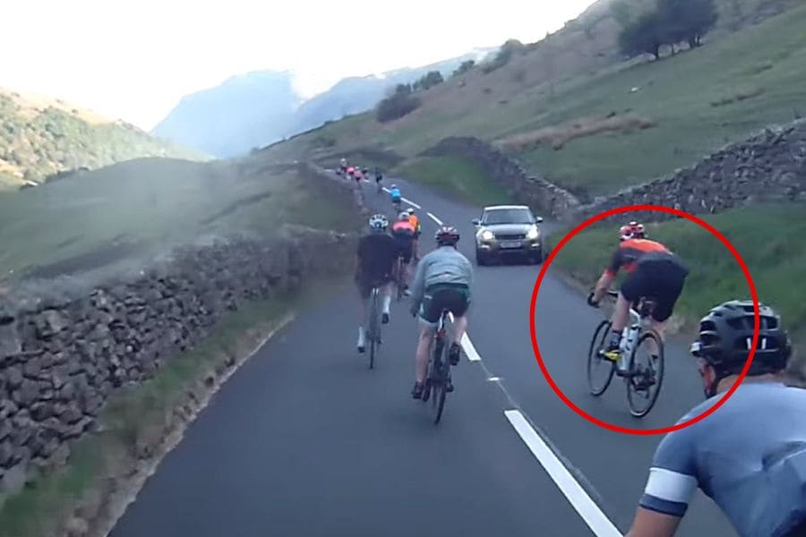 Watch This Cyclist’s Insane Blind-Bend Overtake That Nearly Ends in Disaster